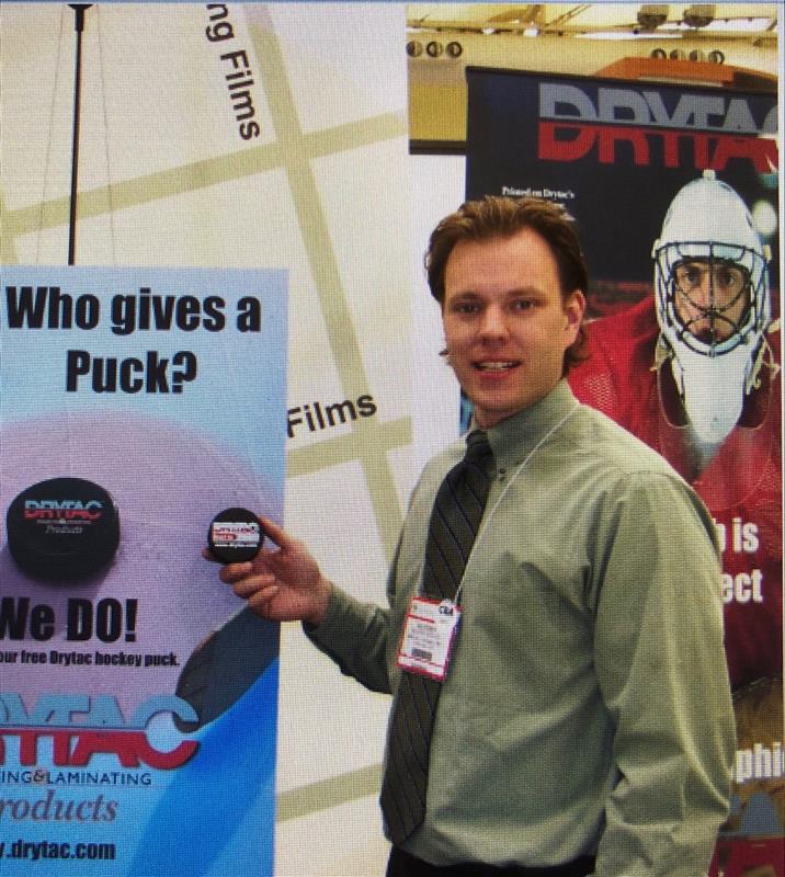 Drytac trade show hockey puck campaign