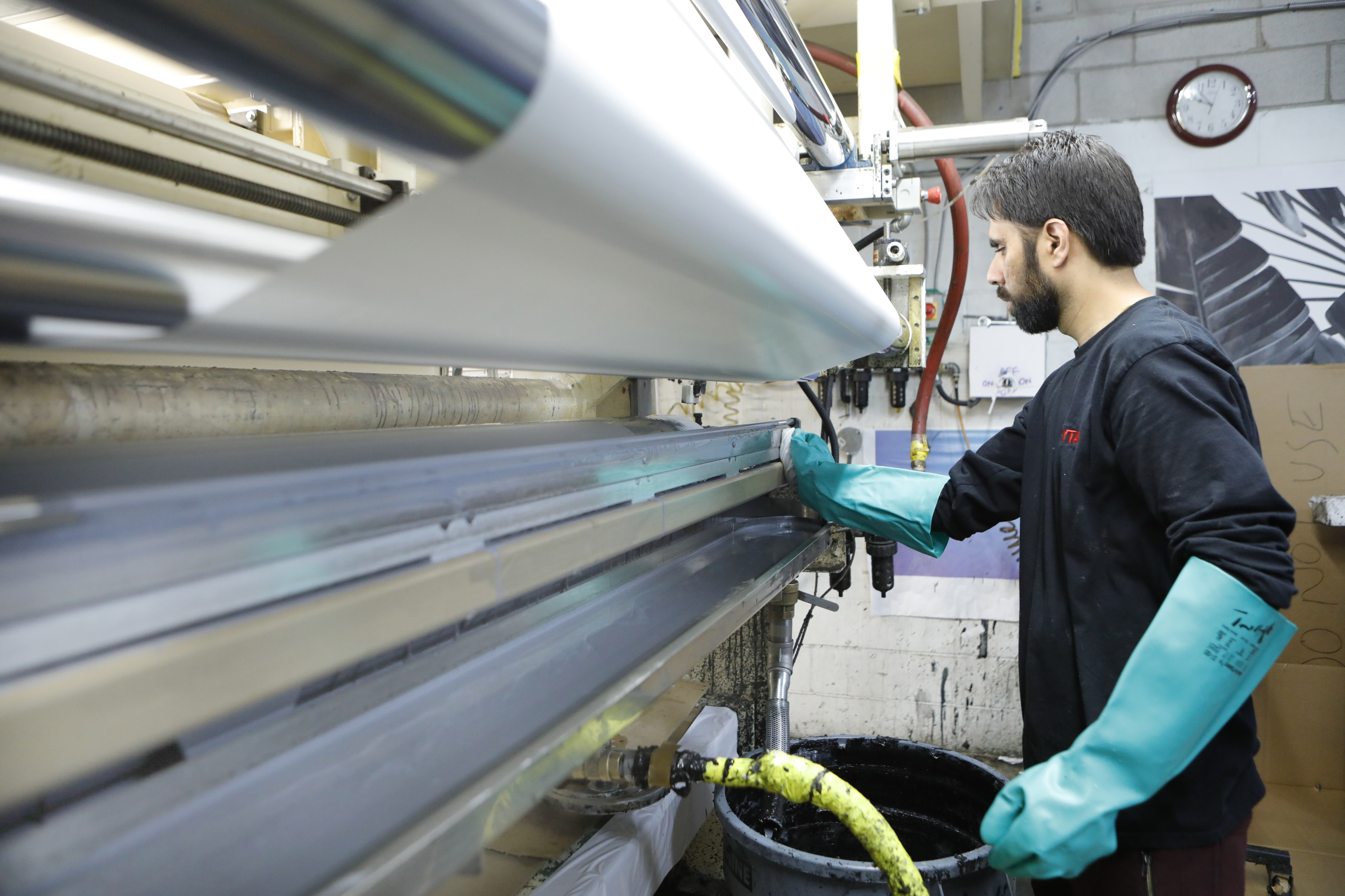 Drytac window film being applied